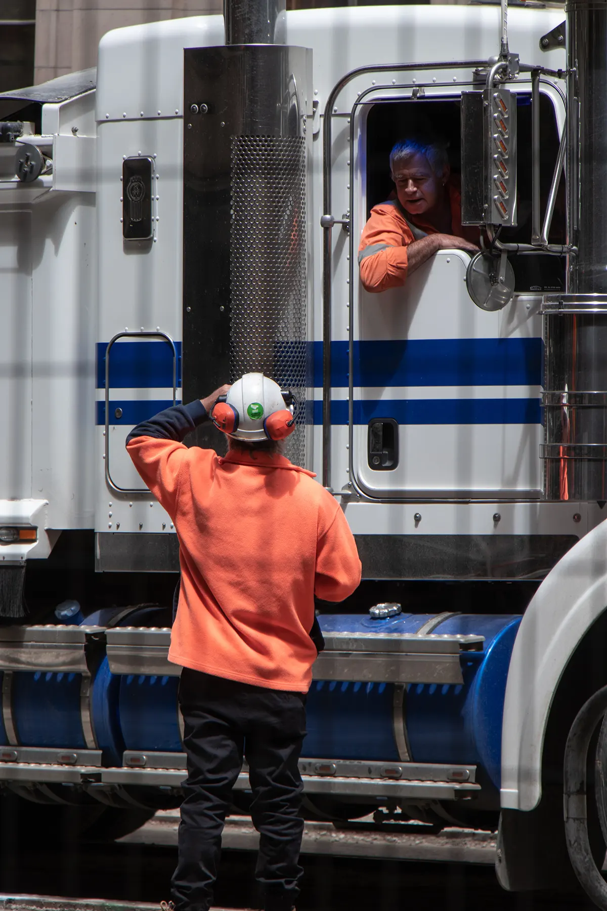 Worker in front of a truck